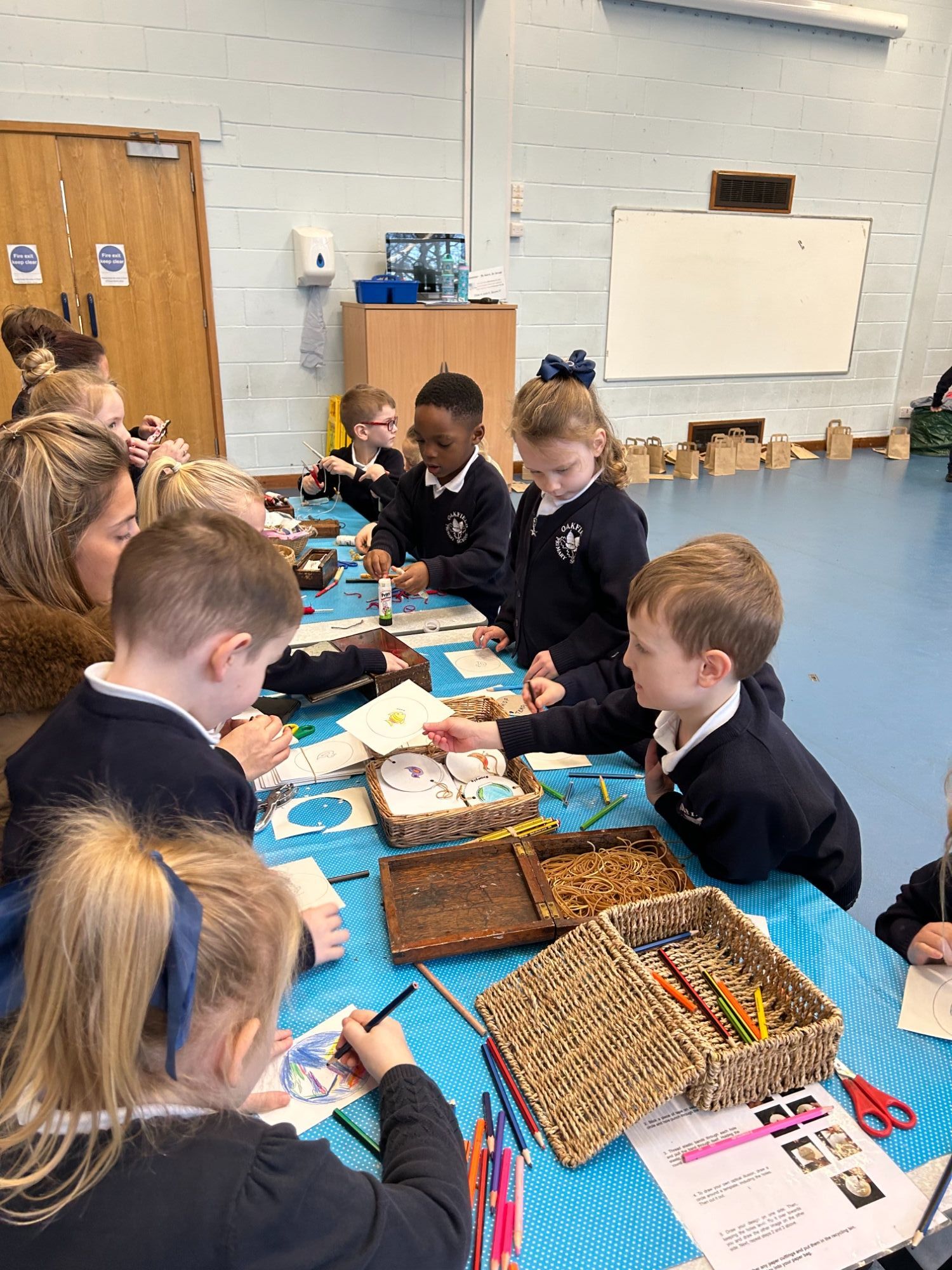 Image to show children working during the toy workshop